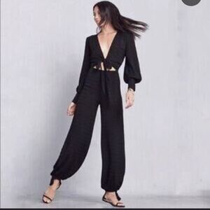 Reformation black peek hole jumpsuit